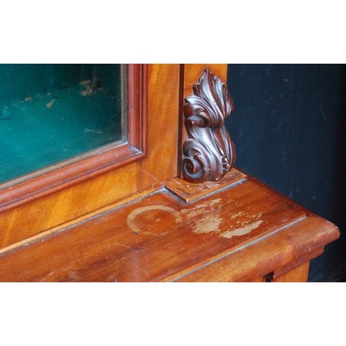 388 - Victorian mahogany library bookcase with two arched glazed doors enclosing a shelved interior, flank... 