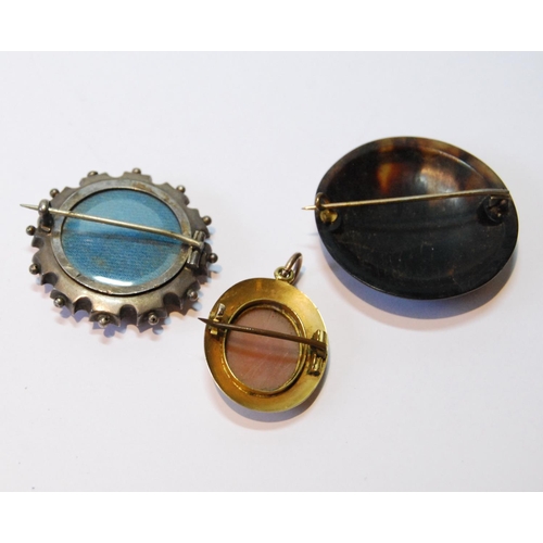 71 - Victorian silver and gold circular brooch, another, with gold band on tortoiseshell, and a Victorian... 