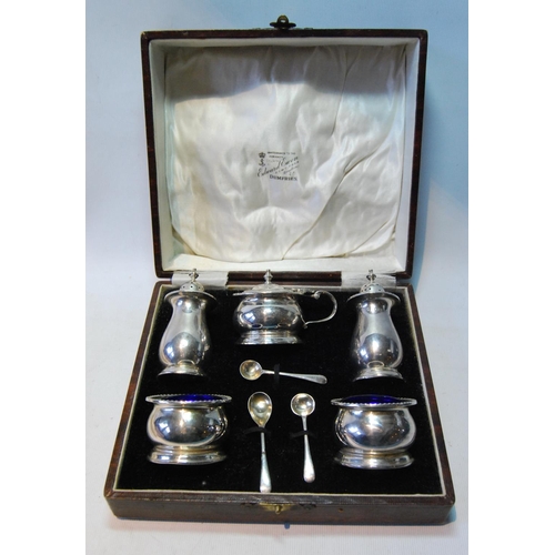 81 - Five-piece silver condiment set of baluster shape, Birmingham 1924, 184g or 5½oz, cased.