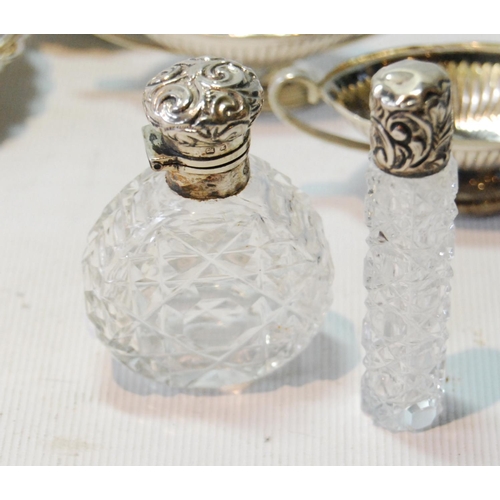 85 - Two silver-mounted glass scent bottles, four pairs of salts and other items, weighable 194g or 6oz.