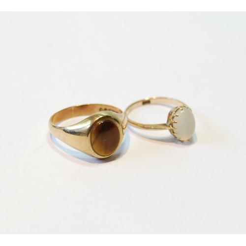 91 - 9ct gold ring with tiger's eye and another with chalcedony, sizes P and I.  (2)