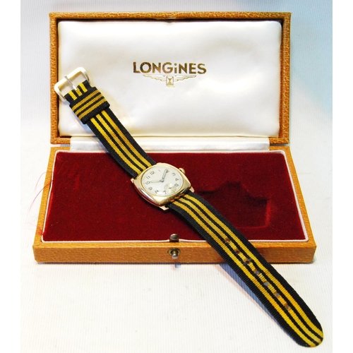 99 - 9ct gold watch with silvered dial in 9ct gold cushion case, 1944, 29mm, excluding button, Longines b... 