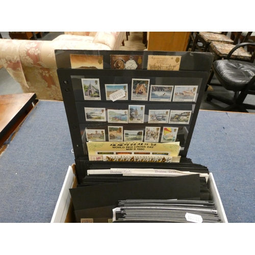 118 - Large box of World stamps.