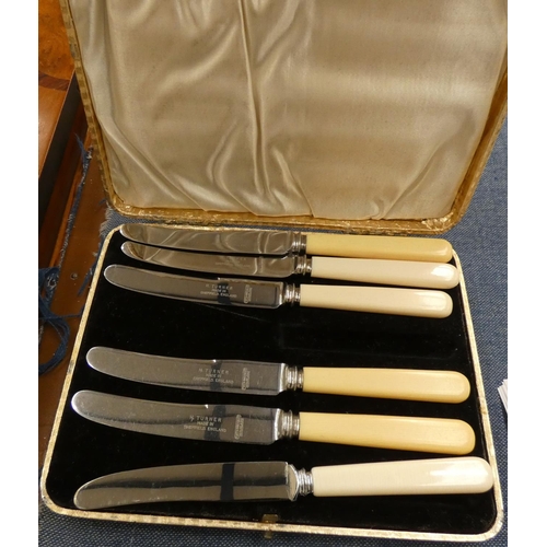 152 - Set of six silver spoons and a set of boxed knives.