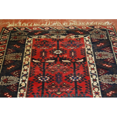 318 - Turkish Dosemealti hand-knotted rug decorated all over with geometric motifs on a red, white and blu... 