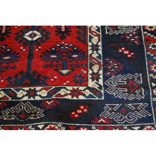 318 - Turkish Dosemealti hand-knotted rug decorated all over with geometric motifs on a red, white and blu... 