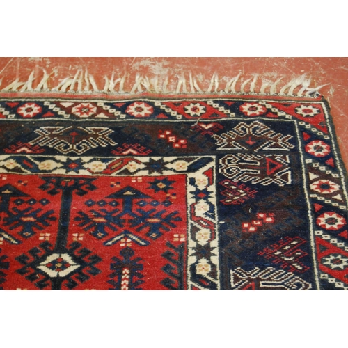 318 - Turkish Dosemealti hand-knotted rug decorated all over with geometric motifs on a red, white and blu... 