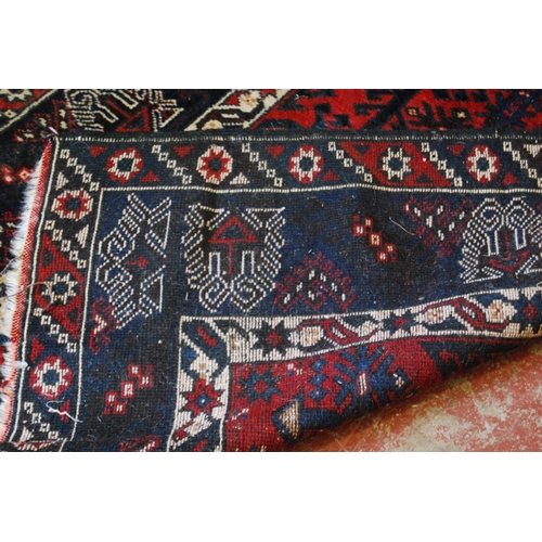 318 - Turkish Dosemealti hand-knotted rug decorated all over with geometric motifs on a red, white and blu... 