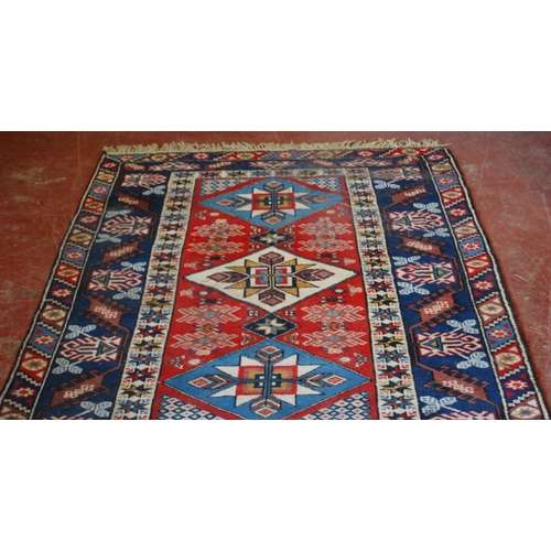 320 - Turkish Dosemealti hand-knotted rug decorated with three geometric medallions to the centre with fur... 