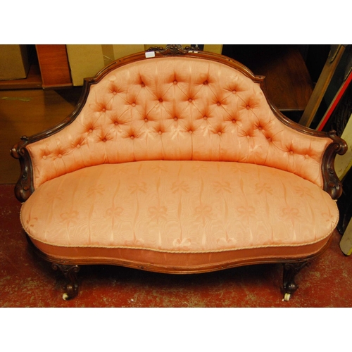 390 - Late Victorian rosewood and walnut button-back parlour sofa upholstered in later pink fabric, scroll... 