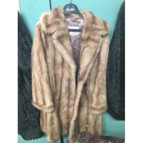 272 - Fur coats, a leather coat, etc.