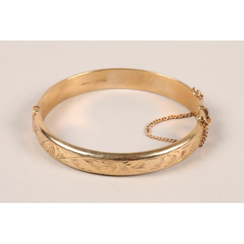 119 - Ladies 9ct gold stiff bangle; gross weight 12.7g