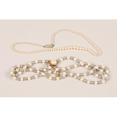 139 - Two cased simulated pearl necklaces