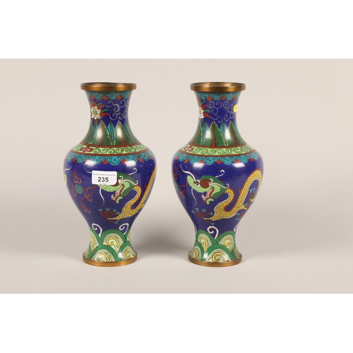 235 - Pair of Japanese Cloisonné vases; 27cm high; decorated with flying dragons and flaming pearls