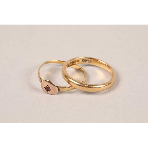 94 - 9 carat yellow gold wedding bandl; ring size M; together with a 9 carat yellow gold and ruby set hea... 