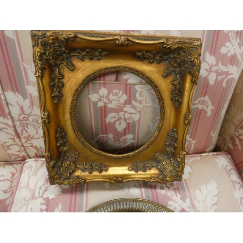 250 - Eastern brass tray and a gilt frame.