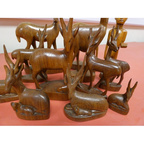 292 - Eleven Impala African carvings and Ascari figure