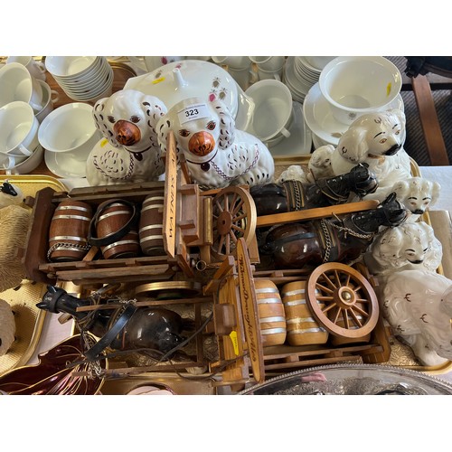 323 - Three pairs of Beswick and Staffordshire dogs together with two horse drawn carts