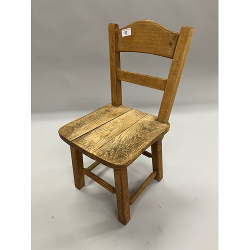 62 - Oak child's chair; 56cm high