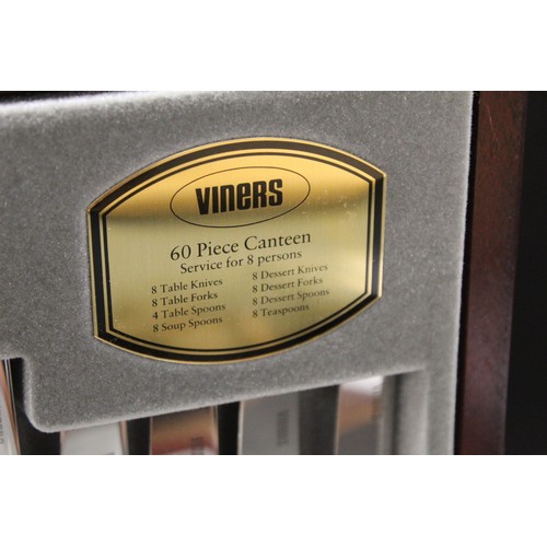 320 - Cased box of Viners cutlery (eight settings).