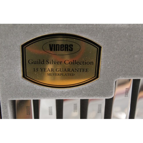 320 - Cased box of Viners cutlery (eight settings).