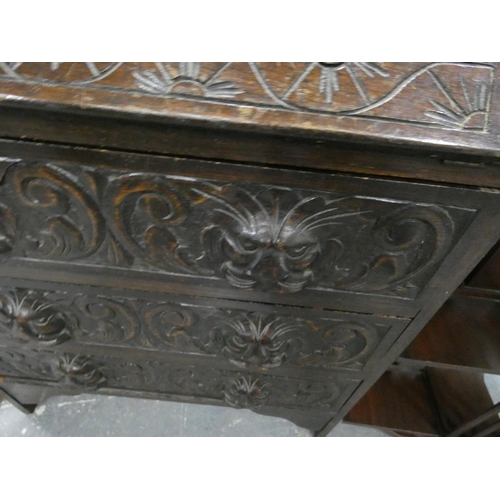 339 - Carved oak writing bureau.