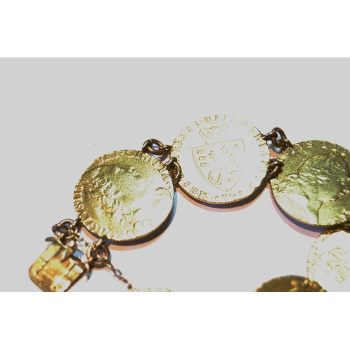 159 - George III gold half guinea coin bracelet comprising six half guineas with dates for 1791, 1793, 179... 