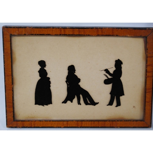 301 - Group of Regency silhouette portraits to include a male, a maid, and an artist painting a gentleman,... 