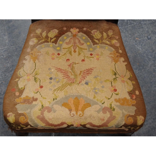 389 - Victorian rosewood prie-dieu with barley column frame, upholstered in floral fabric with eagle decor... 