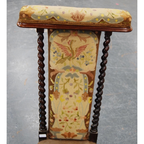 389 - Victorian rosewood prie-dieu with barley column frame, upholstered in floral fabric with eagle decor... 