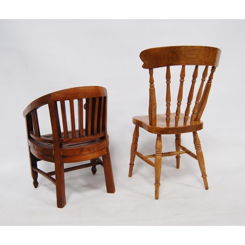 199 - Two apprentice chairs modelled as a Victorian kitchen chair and a bow-back chair, 30cm high and 23.5... 