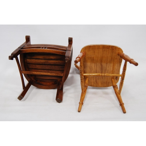 199 - Two apprentice chairs modelled as a Victorian kitchen chair and a bow-back chair, 30cm high and 23.5... 