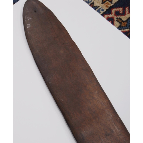 214 - Aboriginal fish tail paddle club (Rainforest sword), with shaped grip, 147.5cm long and 13.5cm wide.