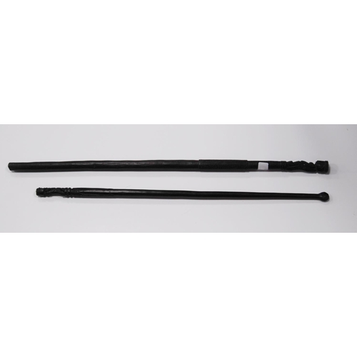 215 - Papua New Guinea Malangan ebonised staff with tribal figure grip, incised markings and scrolls to th... 