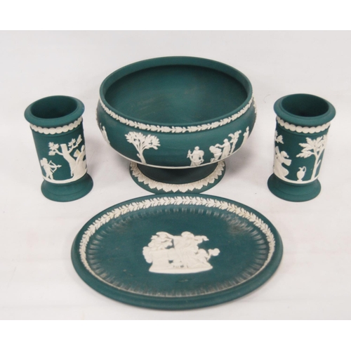 236 - Four pieces of Wedgwood sea green Jasper ware to include a bowl, oval dish and a pair of spill vases... 