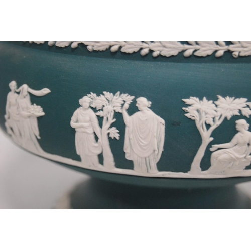 236 - Four pieces of Wedgwood sea green Jasper ware to include a bowl, oval dish and a pair of spill vases... 