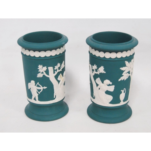 236 - Four pieces of Wedgwood sea green Jasper ware to include a bowl, oval dish and a pair of spill vases... 