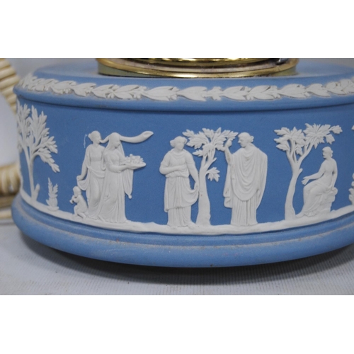 238 - Wedgwood blue Jasper ware telephone decorated with classical figures and putti, 18cm high.