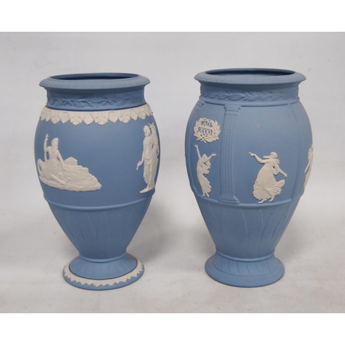 239 - Three Wedgwood blue Jasper ware vases, all decorated with classical figures, 20cm high.  (3)