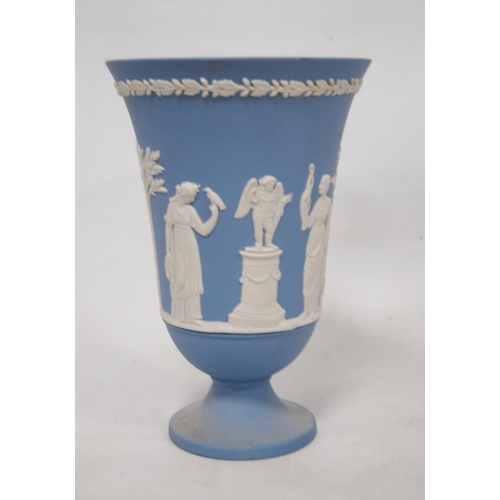 239 - Three Wedgwood blue Jasper ware vases, all decorated with classical figures, 20cm high.  (3)