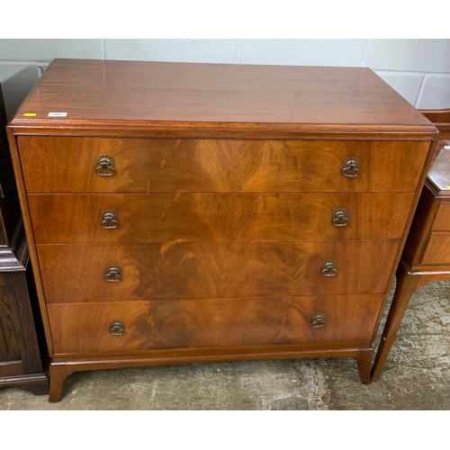 458 - 1930s mahogany three piece bedroom suite comprising of four drawer chest, mirror back dressing table... 