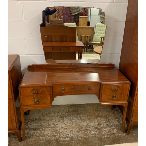 458 - 1930s mahogany three piece bedroom suite comprising of four drawer chest, mirror back dressing table... 