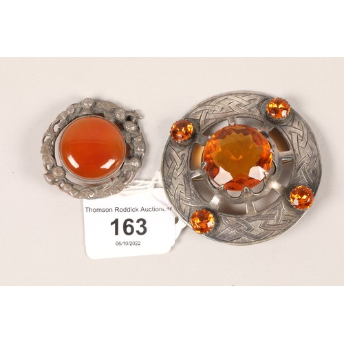 163 - Celtic design orange stone and silver brooch and one other Scottish design brooch (2)