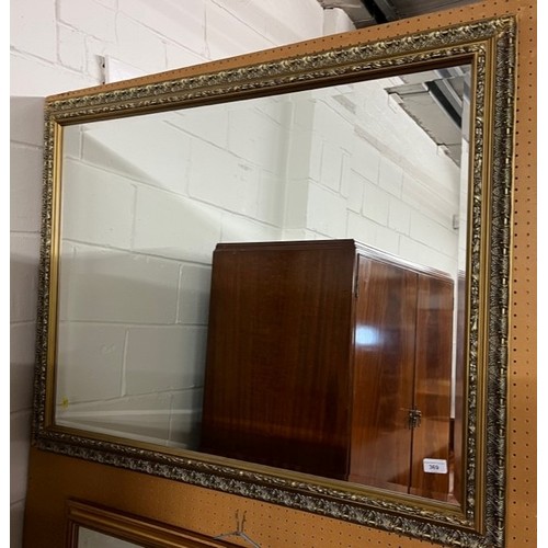 369 - Gilt framed bevel edged hanging wall mirror