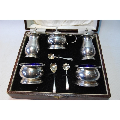 81 - Five-piece silver condiment set of baluster shape, Birmingham 1924, 184g or 5½oz, cased.