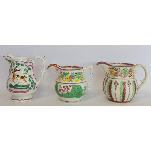 272 - Two 19th century graduated pearlware copper lustre jugs with polychrome panels depicting faith and c... 