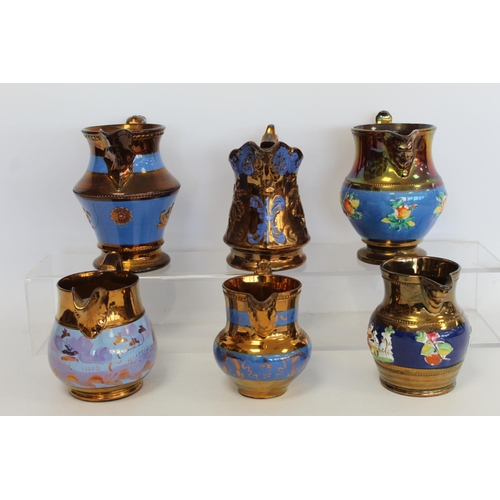 277 - Six Victorian copper lustre jugs, four with moulded decoration, the largest 16.5cm high.  (6).