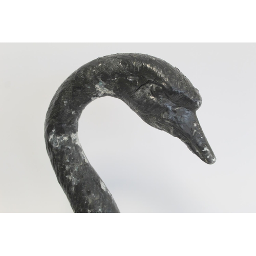 280 - Black painted cast metal garden ornament in the form of a swan, 58cm high.