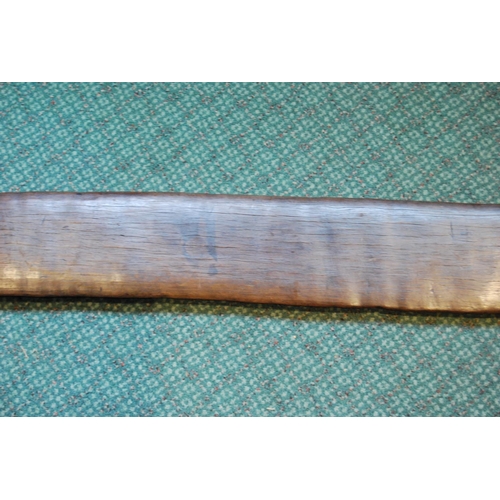 214 - Aboriginal fish tail paddle club (Rainforest sword), with shaped grip, 147.5cm long and 13.5cm wide.