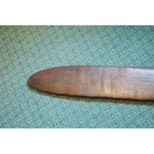 214 - Aboriginal fish tail paddle club (Rainforest sword), with shaped grip, 147.5cm long and 13.5cm wide.